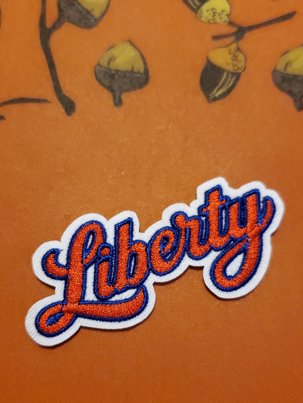 liberty Orange Script Patch with Blue Outline and White Border